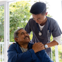 caregiver and senior looking each other