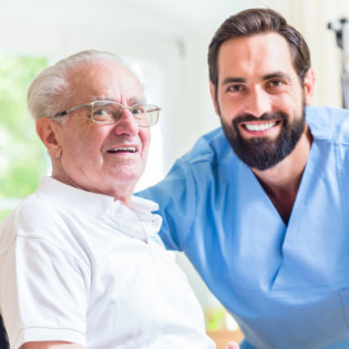 medical worker and elderly smiling