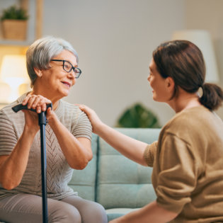 woman with elderly at home