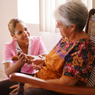 healthcare worker and senior woman