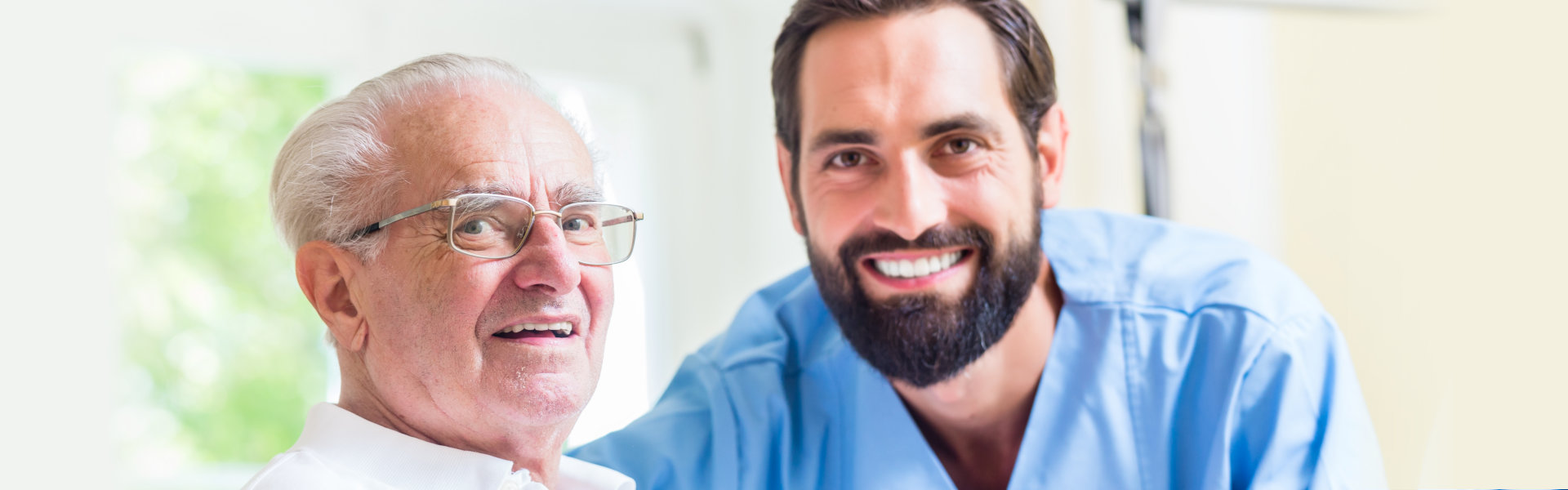 medical worker and elderly smiling